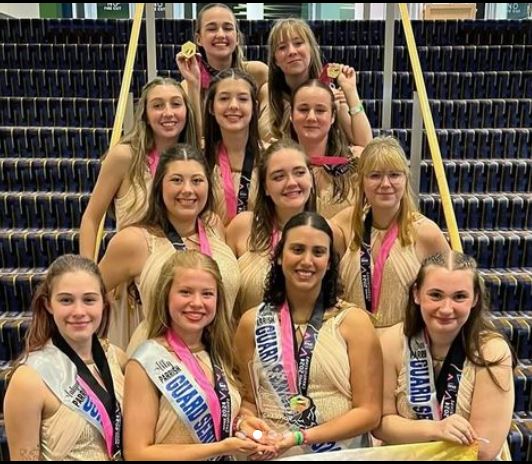  Winter Guard team with their state championship medals
